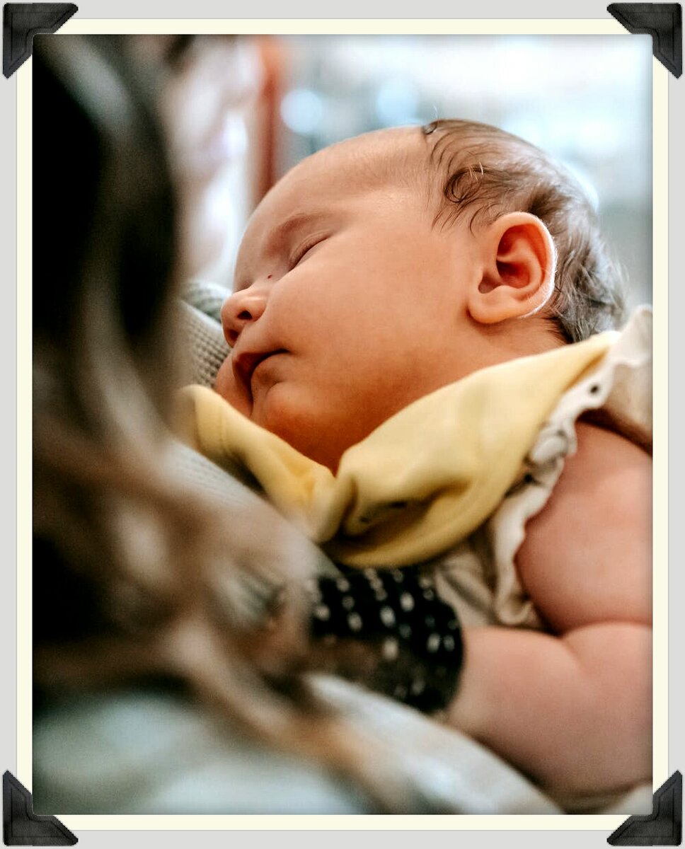 младенец на руках