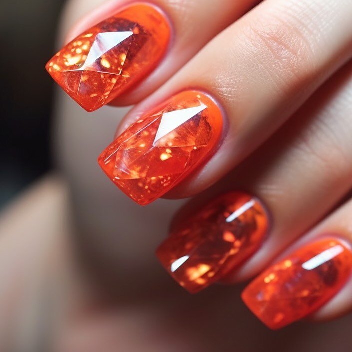 Ярко-оранжевый дизайн кристаллического маникюра.