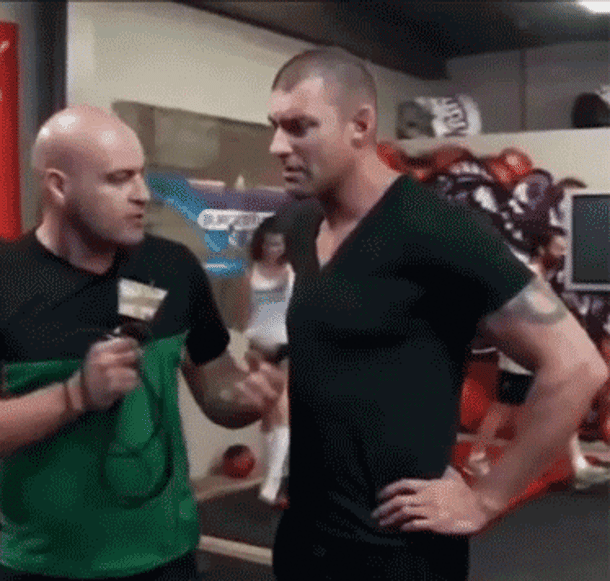 На заднем плане.