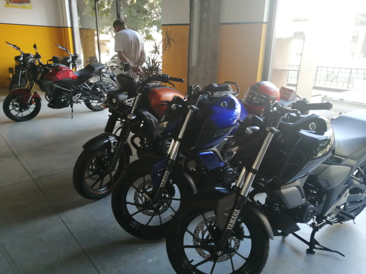 В салоне, где я покупал мотоцикл г. Тбилиси.
