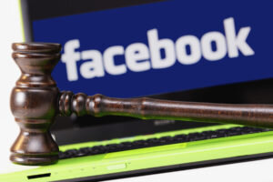    A judge's gavel in front of a laptop computer with a Facebook logo on the monitor, Image: 146513774, License: Rights-managed, Restrictions: MR_No, PR_No, Model Release: no, Credit line: Profimedia, imageBROKER Юлия Карягина