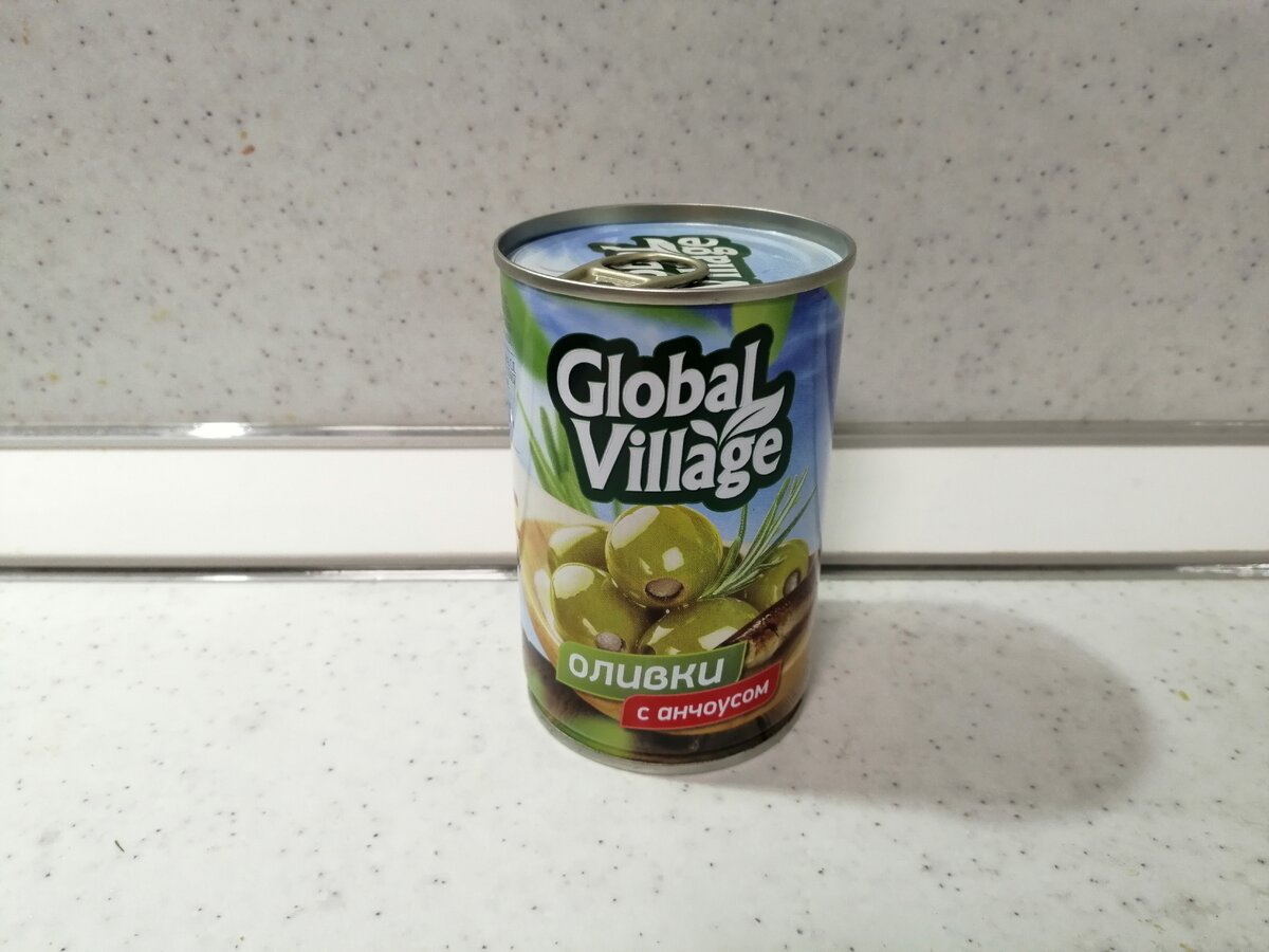 Global village производитель. Оливки Глобал Виладж с анчоусами. Global Village торговая марка. Продукция Глобал Виладж. Марка Global Village маслины.