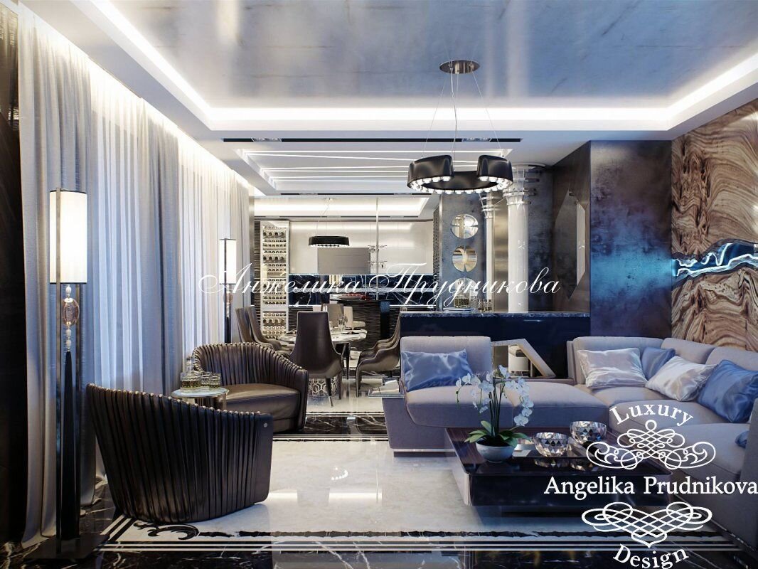 На фото: Современный дизайн кухни-гостиной с чертами футуристического стиля