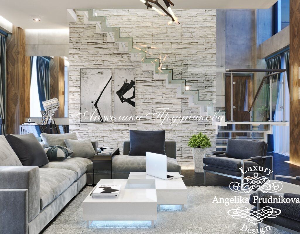 На фото: Гостиная в стиле лофт с лестницей в двухуровневой квартире