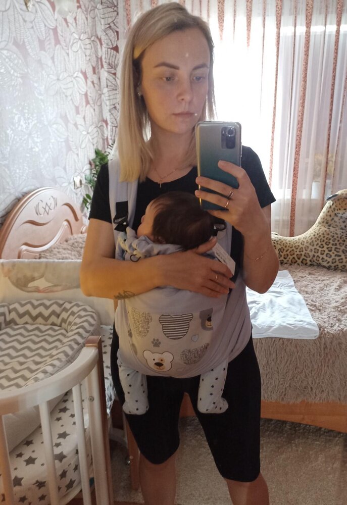 На фото май-слинг от SlingMe