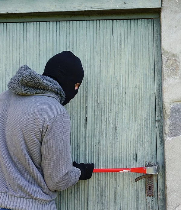 https://pixabay.com/photos/thief-burglary-break-into-balaclava-1562699