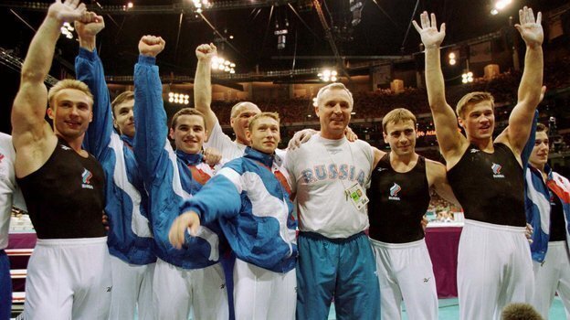 22 июля 1996 года. Атланта. Сборная России — победитель Олимпийский игр в командном зачете, Дмитрий Василенко — третий слева. Фото Reuters