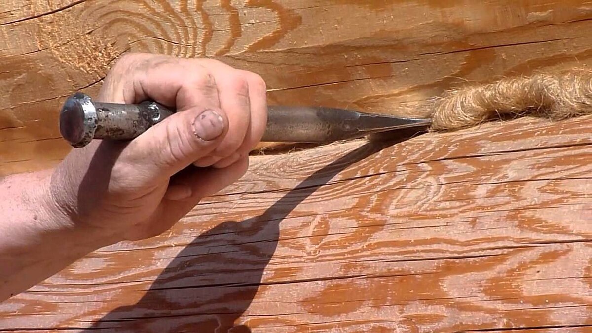 Конопатить паклей