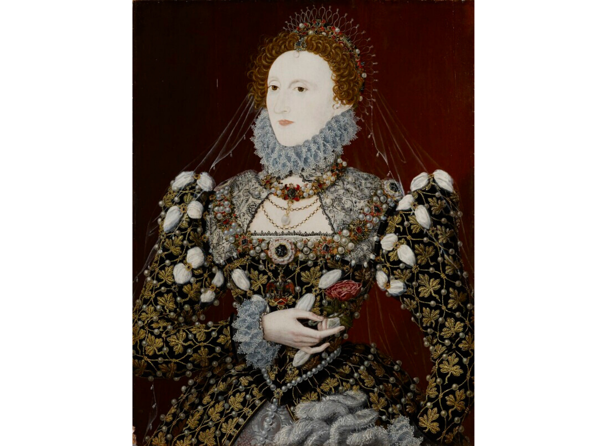 Даже для сцены наряд слишком роскошен. Это королева Елизавета I.