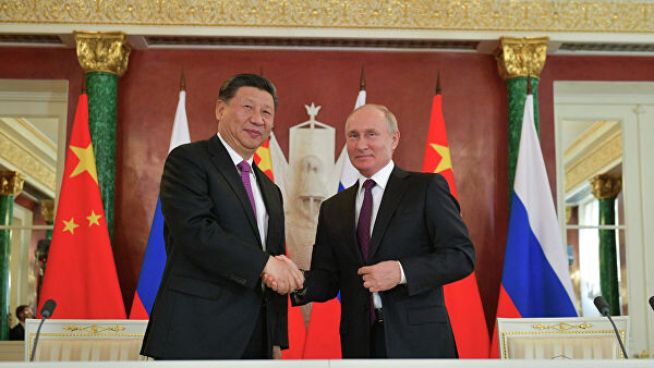 Президент РФ Владимир Путин и председатель КНР Си Цзиньпин на пресс-конференции по итогам российско-китайских переговоров в Кремле. 5 июня 2019