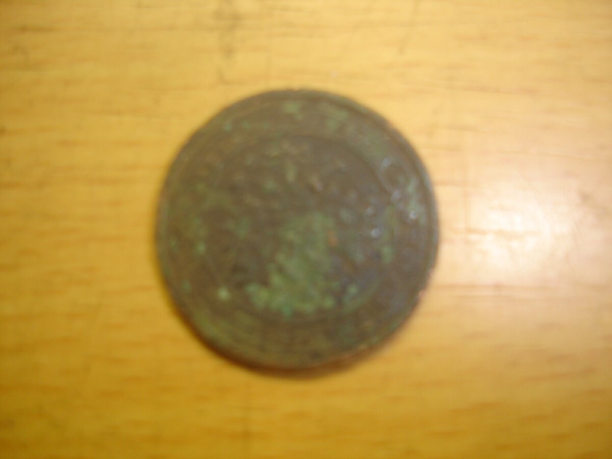 на фото старинная монеты России