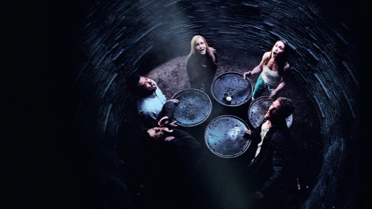 Голод - это одно из самых страшных чувств человечества. Как далеко можно зайти, чтобы выжить в чрезвычайных обстоятельствах? Пятеро незнакомых друг с другом людей просыпаются в подземной темнице, из которой нет выхода. Вскоре они понимают, что стали жертвами садистского эксперимента по проверке желания человека выжить. Проходит день за днём без надежды на спасение, а вместо этого приходит чувство страшного голода, которое уничтожает всё человеческое в несчастных людях...