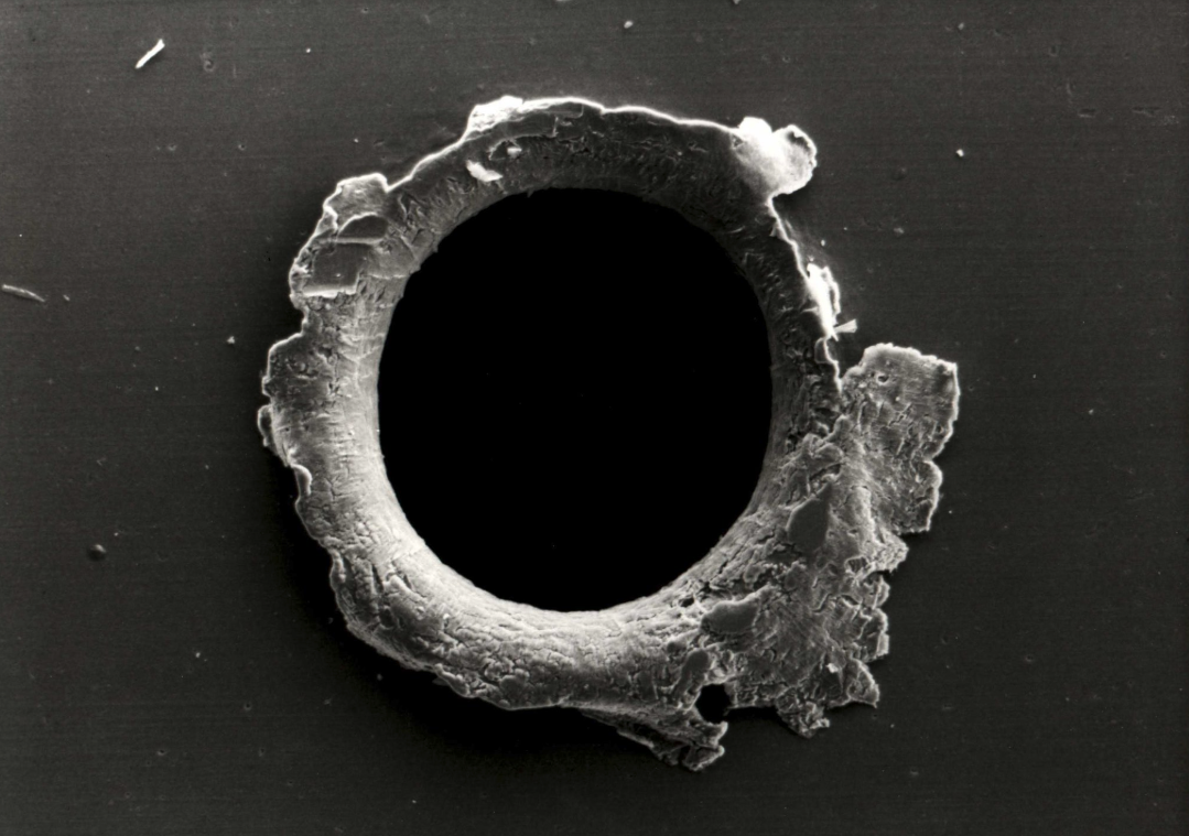 The hole left by space debris in the SolarMax satellite.                                                                        https://s.yimg.com/uu/api/res/1.2/ciHrgZQgVY3qmy2Iy8Zv_Q--~B/aD03NTk7dz0xMDc5O3NtPTE7YXBwaWQ9eXRhY2h5b24-/http://media.zenfs.com/en_US/News/BGR_News/screen-shot-2018-08-31-at-9-20-21-am.png