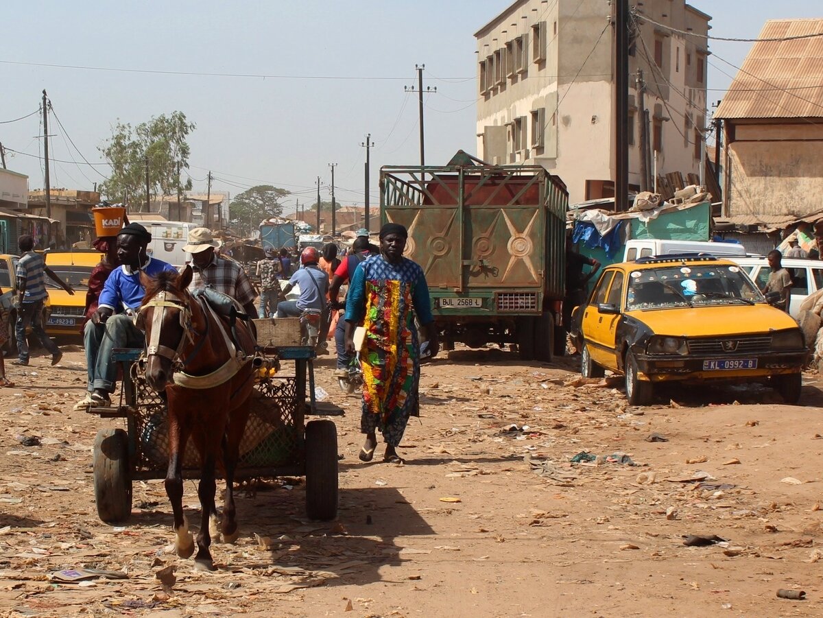 "Africa street, a girl with an ." - image created in Shedevrum