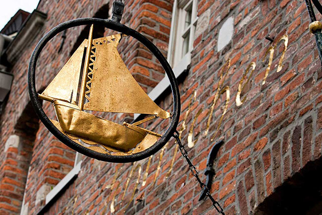 Символ, олицетворяющий название ресторана.