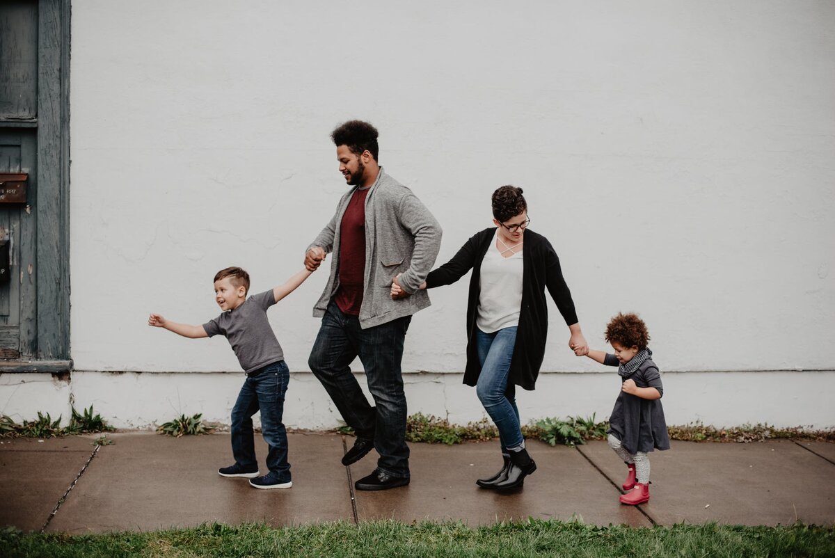 https://www.pexels.com/photo/family-of-four-walking-at-the-street-2253879/