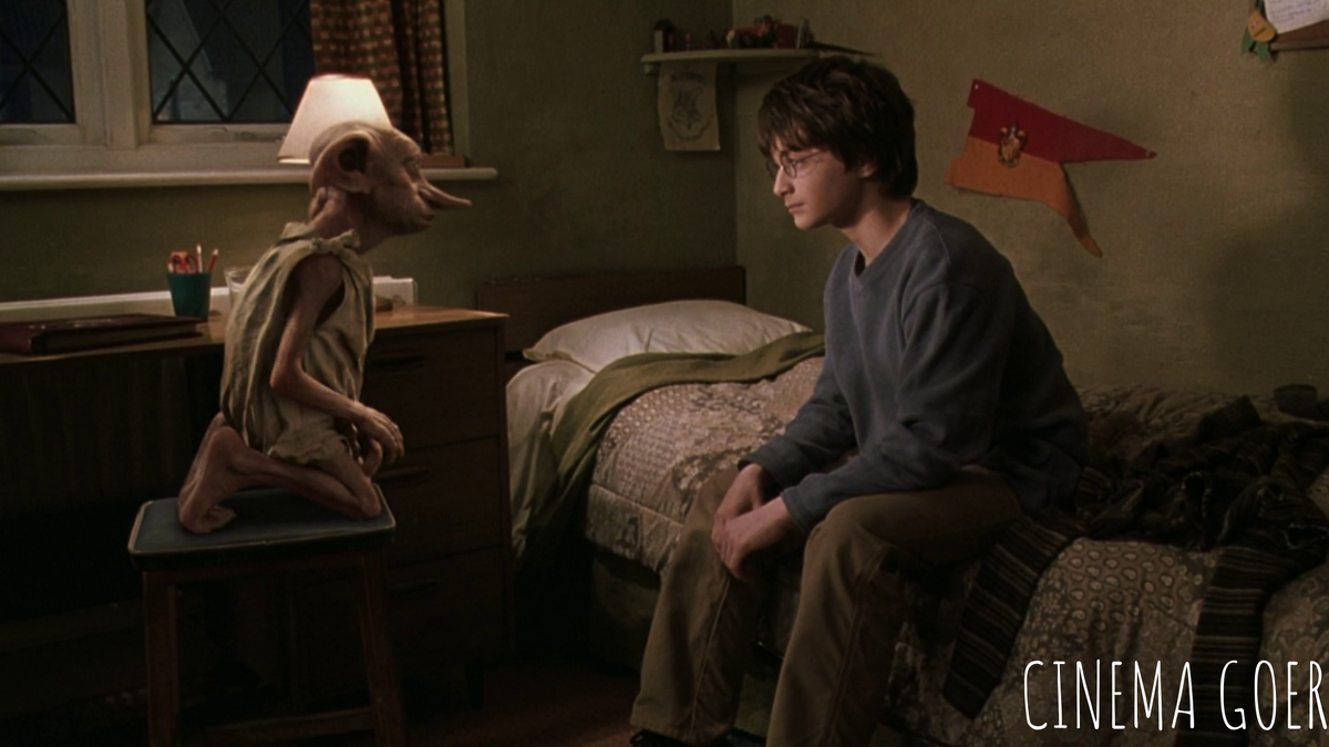 кадр из фильма (что бы актером было понятно куда смотреть, роль головы Добби исполнял висящий на веревке мячик)