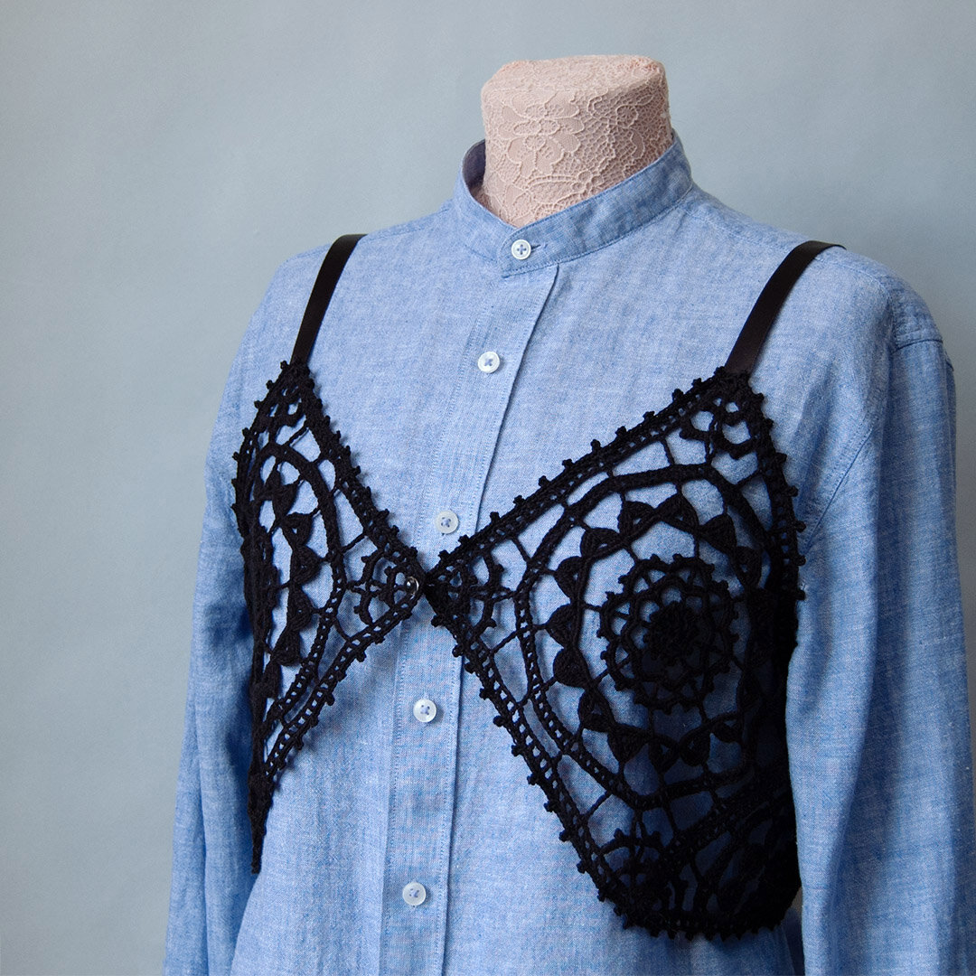 Топ из кружевных мотивов крючком.