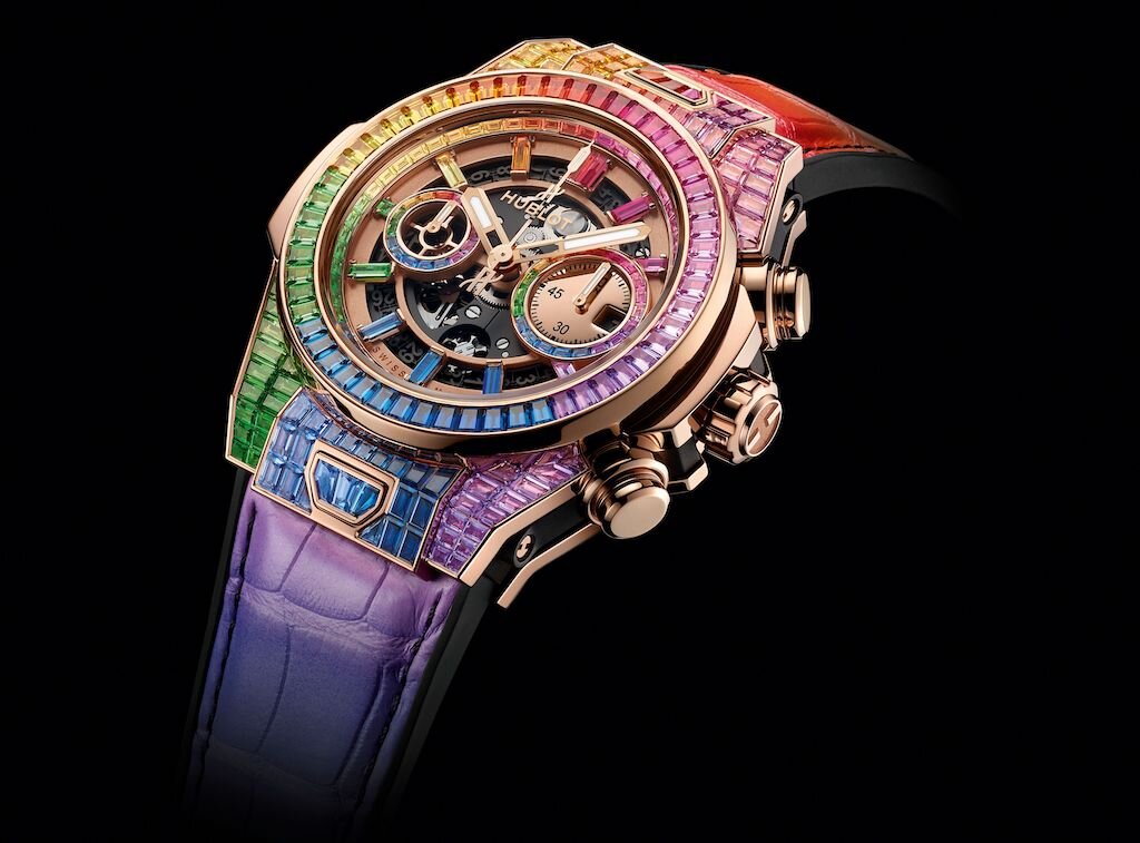 Часы Hublot, фотография взята с сайта https://www.hautetime.com/hublot-big-bang-unico-full-baguette-king-gold-rainbow/98853/