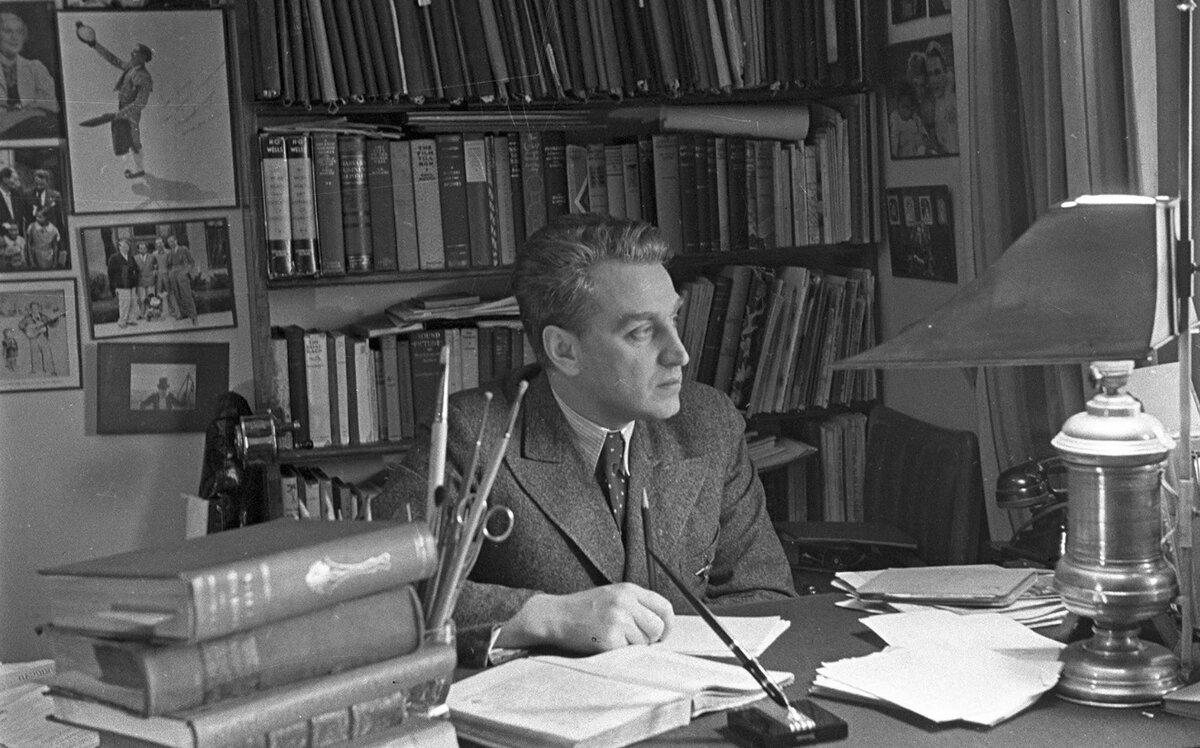 Григорий Александров в своем кабинете