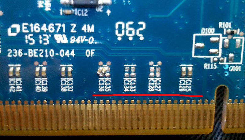 сбитые SMD конденсаторы в районе PCI-E порта видеокарты