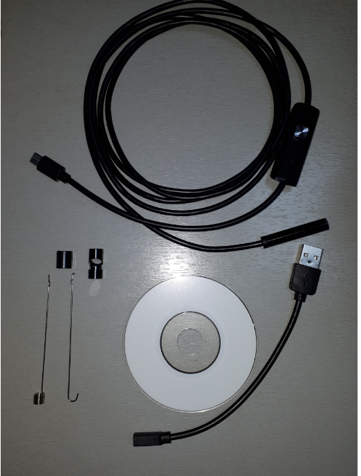 Покупал для Ведроида, в комплекте Камера, магнит, крючок, зеркало, установочный диск, переходник на USB. 