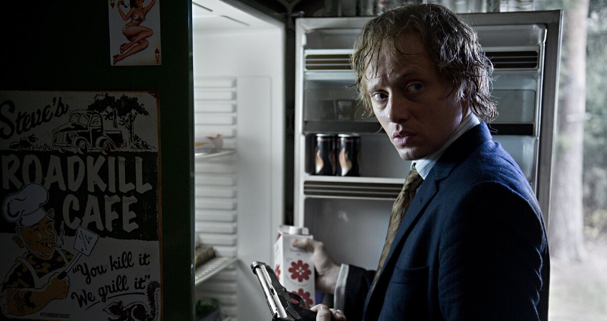 Кадр из фильма "Охотник за головами" (2011)