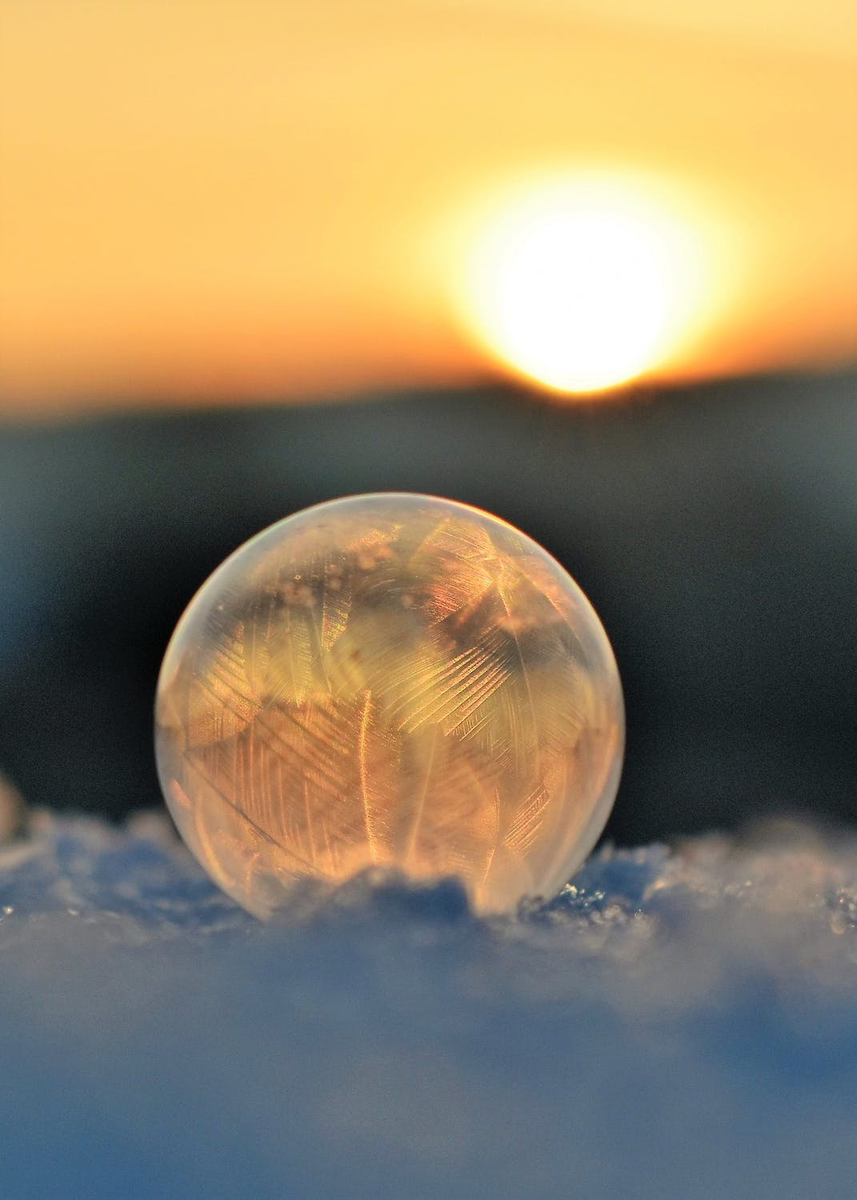 pexels.com/photo/frozen-soap-bubble-against-sky-during-sunset-326168/