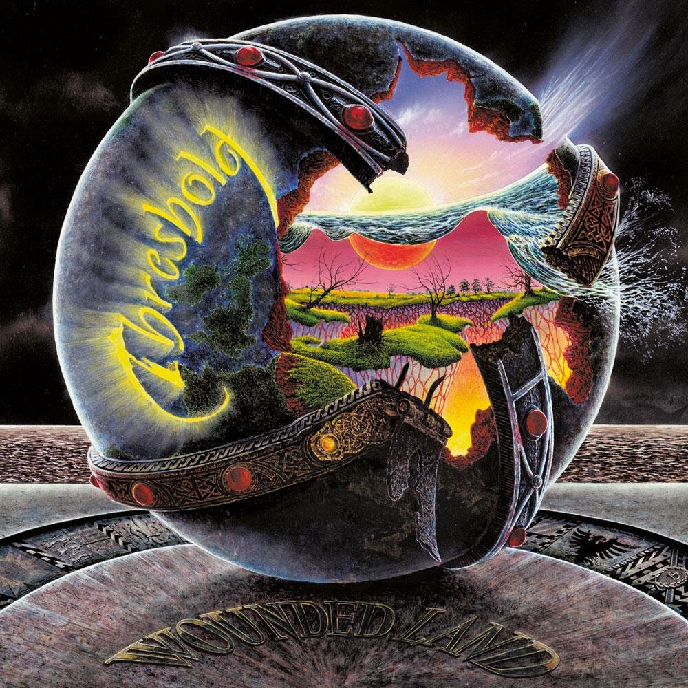 Обложка исходного издания альбома "Wounded Land" (1993, Giant Electric Pea)