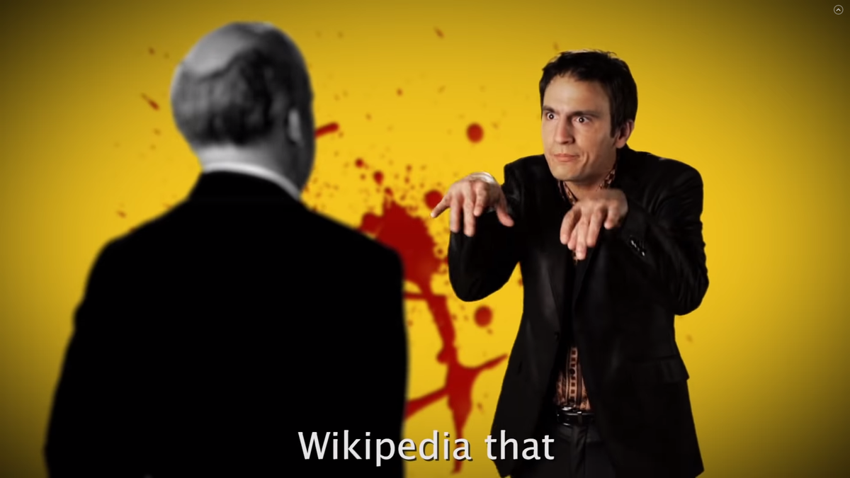 Кадр из Epic Rap Battles of History с глаголом to wikipedia