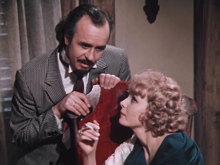 Олег Борисов (Гарин) и Нонна Терентьева в роли мадам Зои. 