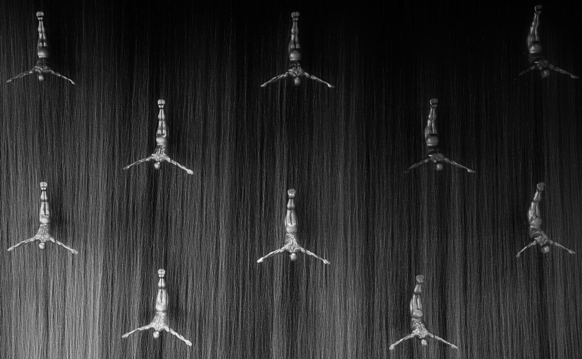 Водопад с ныряльщиками за жемчугом в Dubai Mall