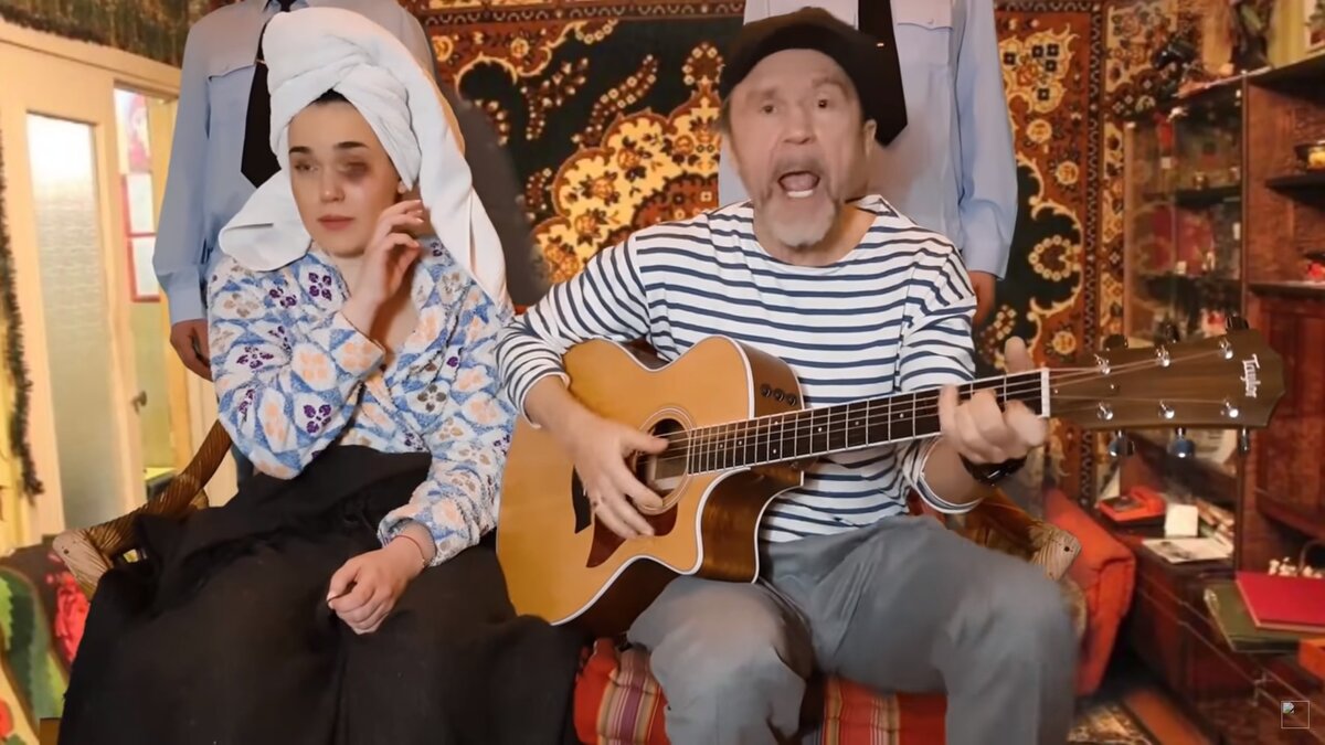 Зоя Зимес и Сергей Шнуров. Кадр из клипа Геополитика - Ленинград