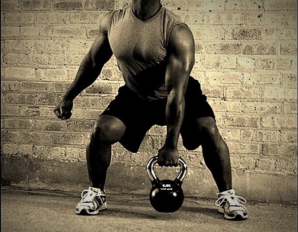 Атлет с гирей