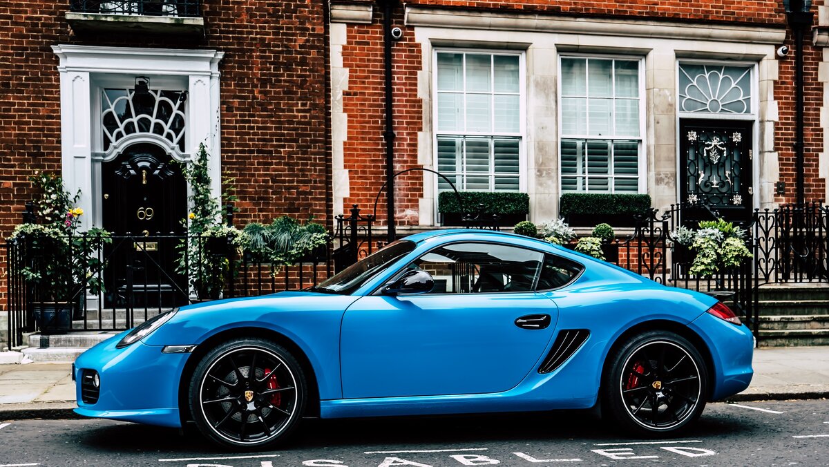 https://www.pexels.com/photo/blue-coupe-on-road-2127740/