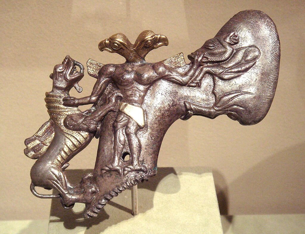 Топор орлиным демоном и животными культуры оазисов