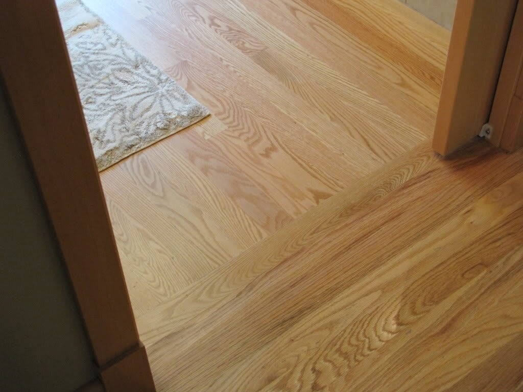 http://decorationinfo.ru/wp-content/uploads/2016/12/wood-floors-hallway-transition-direction-laminate-flooring-1024x768.jpg