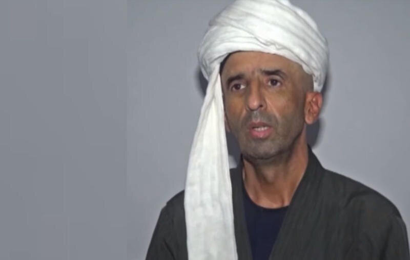 Задержанный в Таджикистане "изгнатель джиннов" Сулаймон Саъдиев. Кадр из репортажа телеканала «Таджикистан»