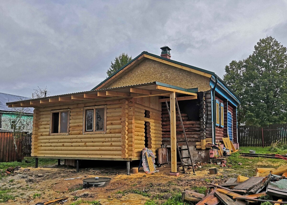 Пристройка к деревянному дому: особенности строительства