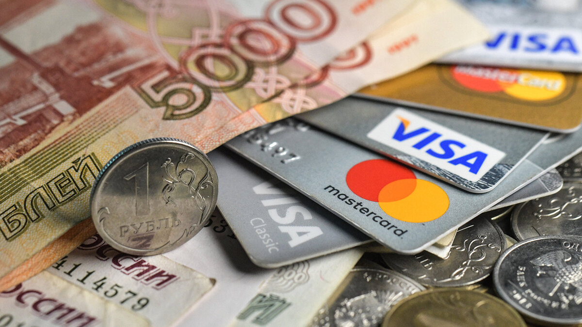    " Денежные купюры, монеты и кредитные карты© РИА Новости . Владимир Трефилов