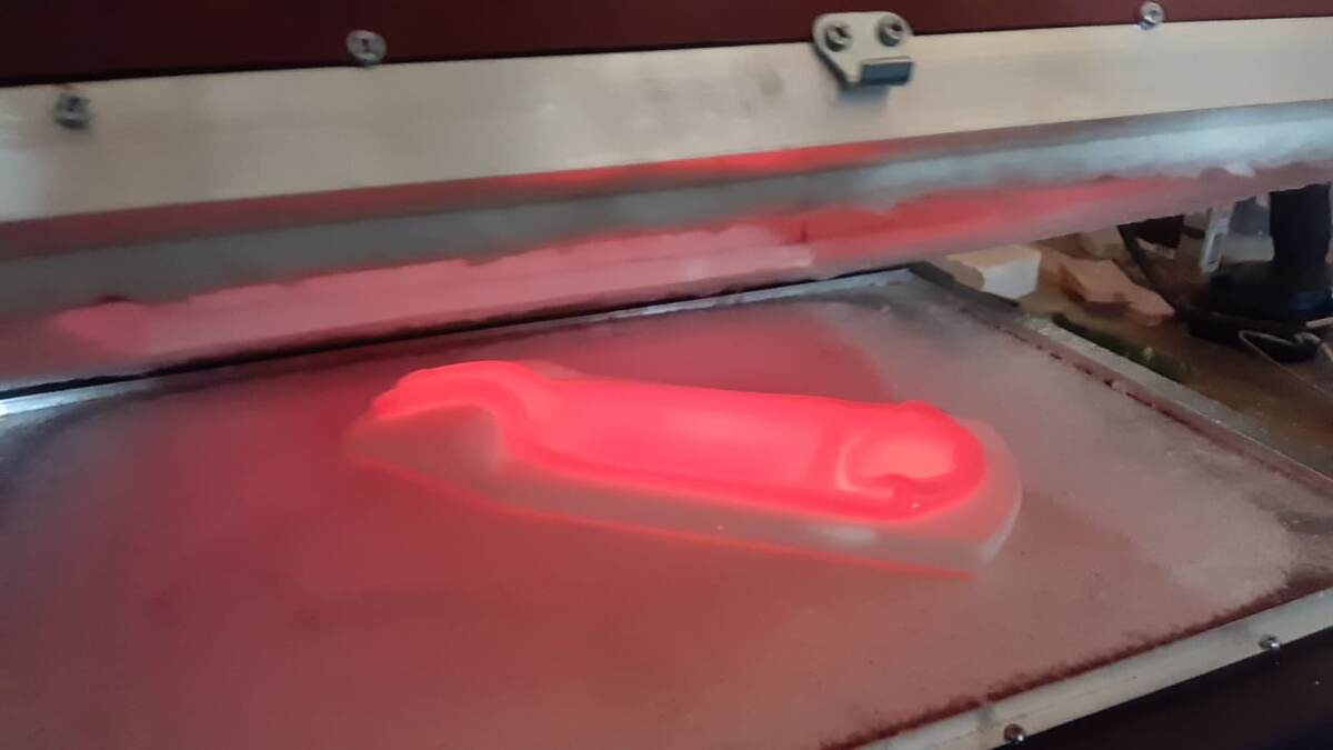 Вид бутылки в печи