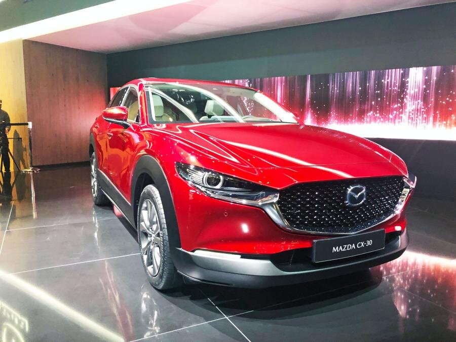 Самая новая мазда 2021