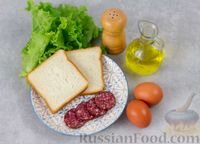 Пошаговый фото рецептГорячие бутерброды с колбасой и яйцом (на сковороде)
