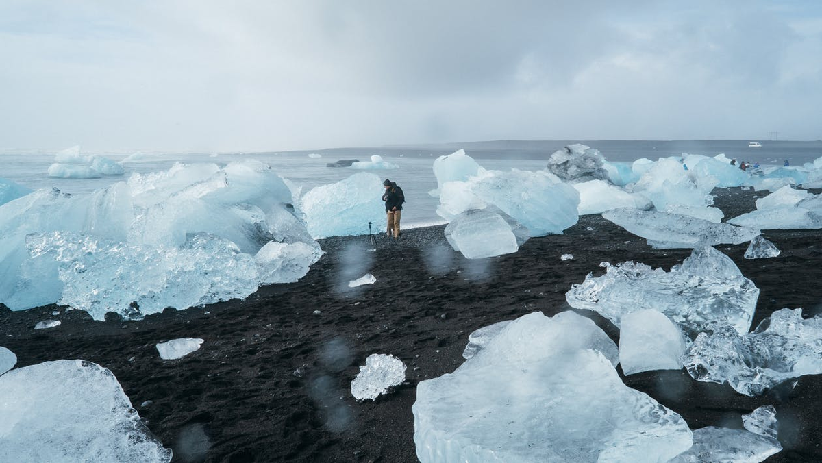 https://www.pexels.com/photo/person-standing-beside-body-of-water-1670845/