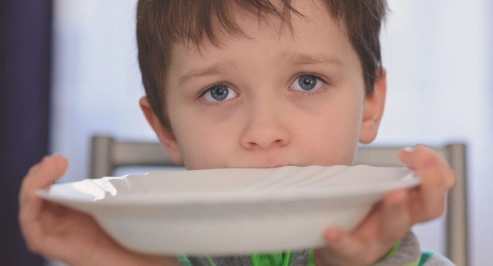 Фото голодающего ребёнка — Википедия