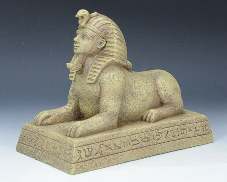 Тело льва и голова. Египет статуя сфинкса Лев. Сфинкс Египте Хармахис. Сфинкс кошка Египет статуя. Статуэтка египетского сфинкса.