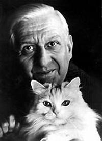 Анри Соге со своей кошкой (Фото из Википедии)