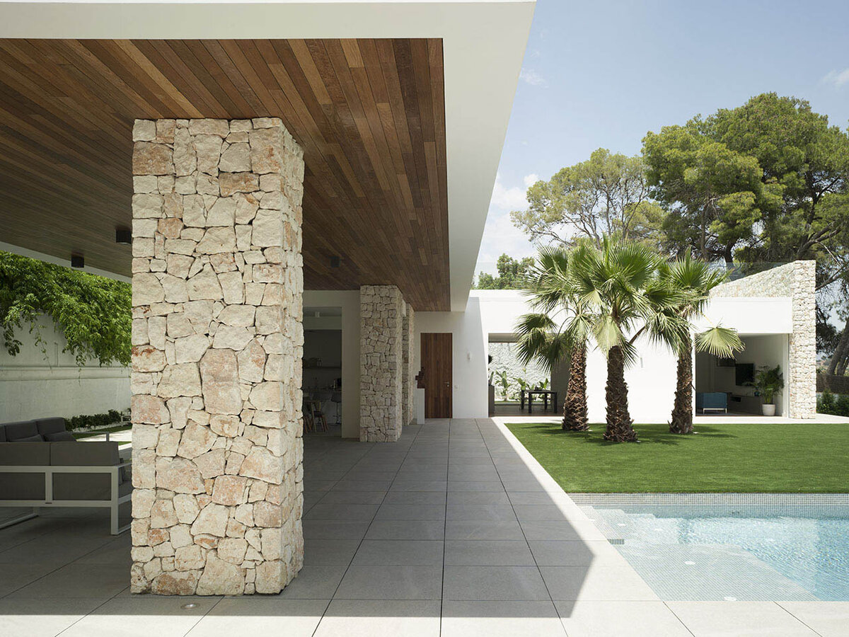 Фото:// TAU Cerámica. Дизайн дома с необычной архитектурой