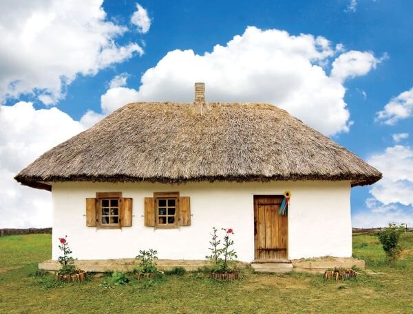 Сельский дом из глины и глиняной крыши