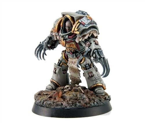 Приёмный отец, Кор Фаэрон. Он не Терминатор и не Астартес - но в него "понапихали" много всего...